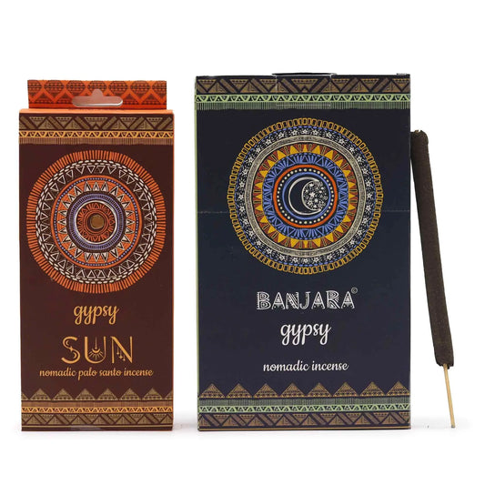 "Gypsy Nomadic Incense SUN palo santo variety in orange and brown packaging with intricate golden sun mandala design, tribal patterns, and natural incense stick displayed alongside"