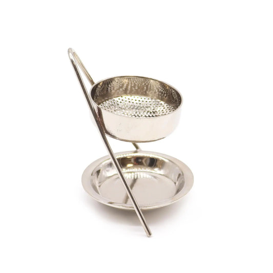 "Plated Brass Resin Incense Warmer Fixed showing perforated screen positioned in upper bowl with curved handle and lower chrome candle dish"