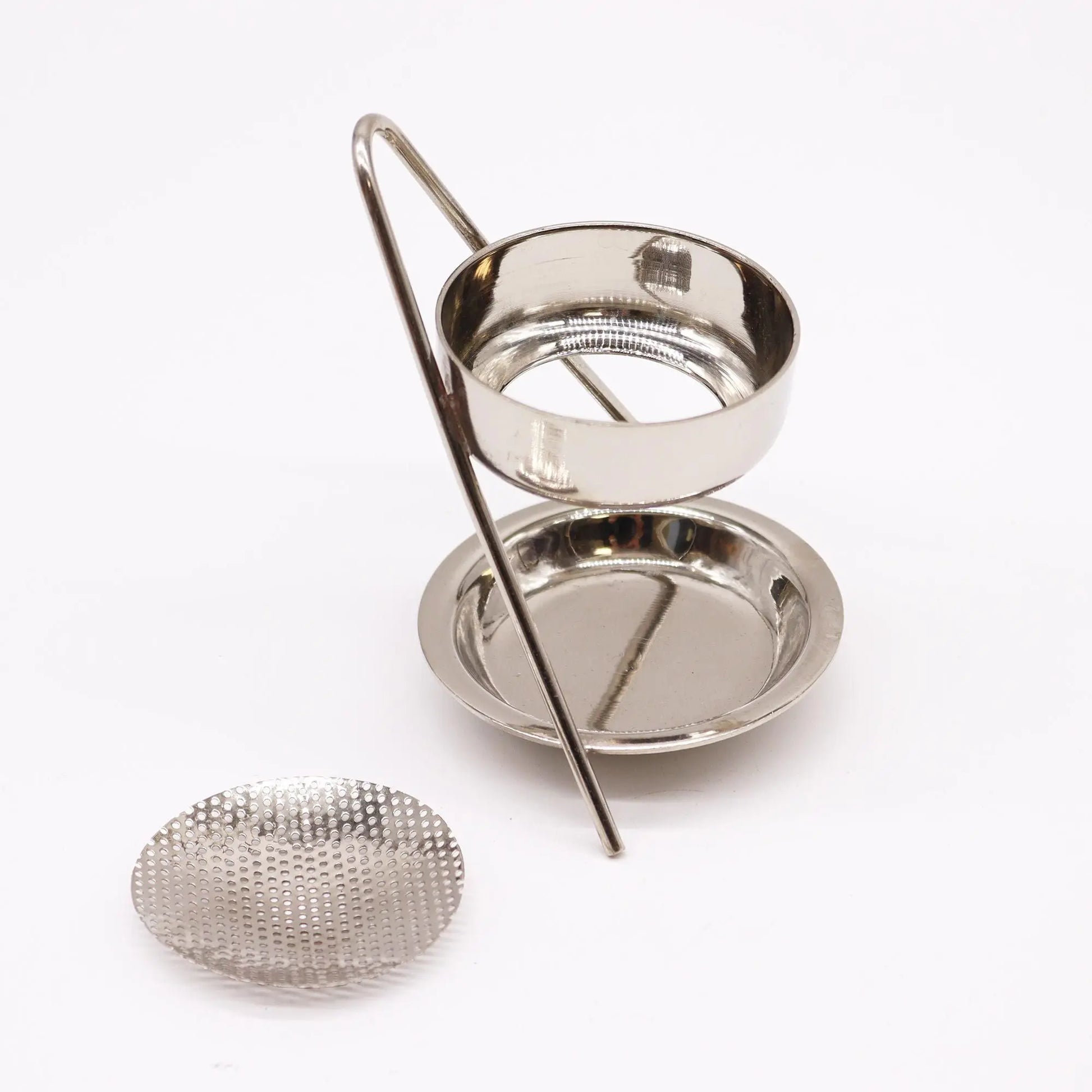 "Plated Brass Resin Incense Warmer Fixed in silver chrome finish with two-tier design, curved handle, and separate perforated screen disc for resin burning"