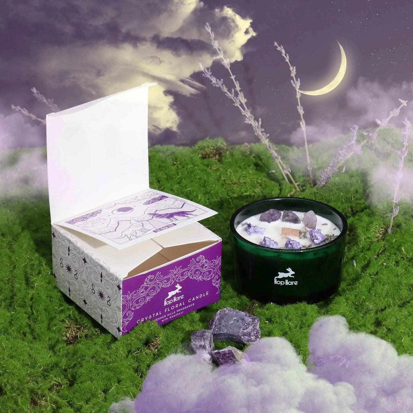  "Hop Hare Crystal Floral Candle with amethyst crystals on moss under purple moonlit sky with lavender sprigs and mystical atmosphere"
