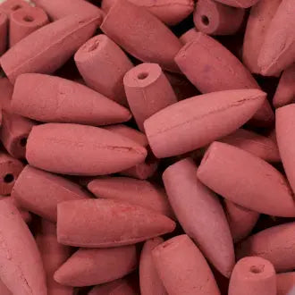 "Midnight Rose Backflow Incense Cones in dusty rose pink color with hollow centers for cascading smoke effect"